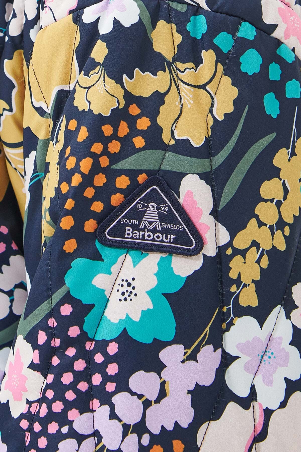 Quilt mit bedrucktem Rittersporn